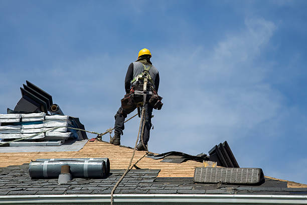 Professional Roofing technician working in Flora, MS